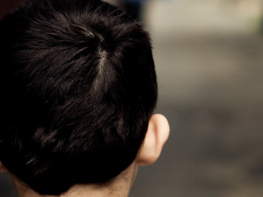 Child with back faced