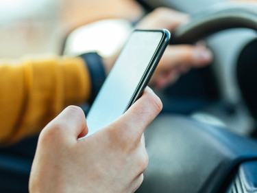 Distracted driver on cell phone