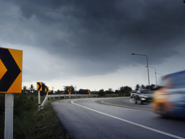 Speeding vehicle approaching turn