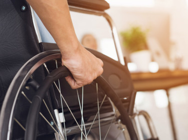 Injured person in wheelchair