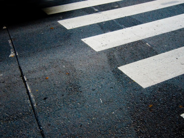 Car speeding through crosswalk