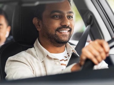 A rideshare driver and passenger travel with confidence, knowing rideshare accident lawyers can help them both if something goes wrong.