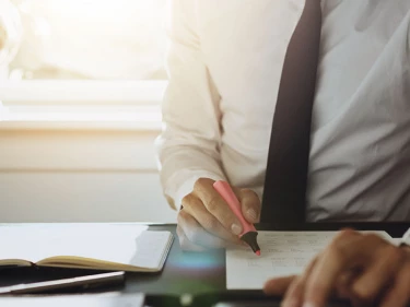 A slip and fall lawyer reviews evidence to build a case.