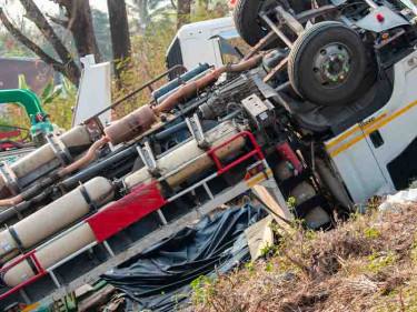 A truck lies upside down after an accident that Texas truck wreck lawyers must investigate.